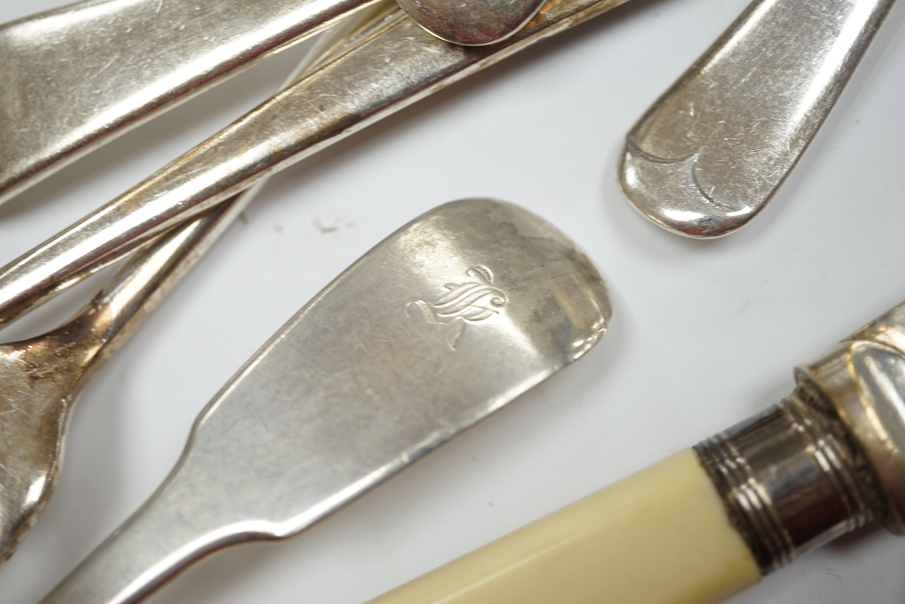 A William IV provincial silver fiddle pattern sauce ladle, John Langdon, Exeter, 1833, together with a set of six later silver coffee spoons, 4.9oz, together with a quantity of assorted plated flatware. Condition - fair